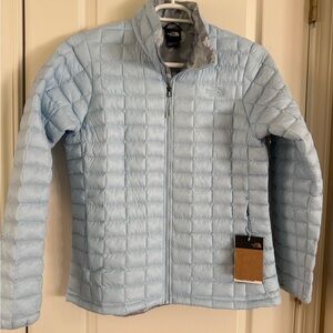 The North Face Woman’s Light Blue with Gray Camouflage Interior Jacket size L